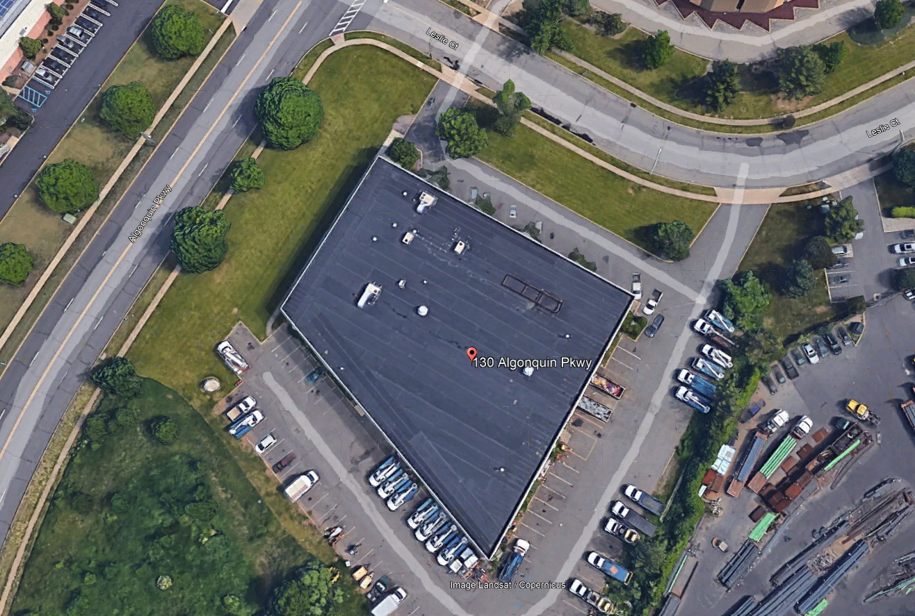 An overhead shot of a manufacturing plant with a new roof.