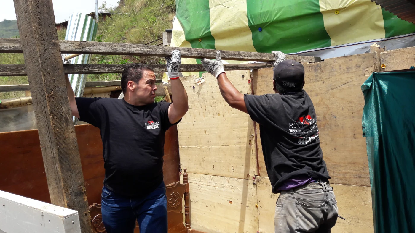 Chuck Anania, owner of 1Call restore helping roof home in need