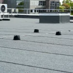 A flat commercial roof with a brand new replacement