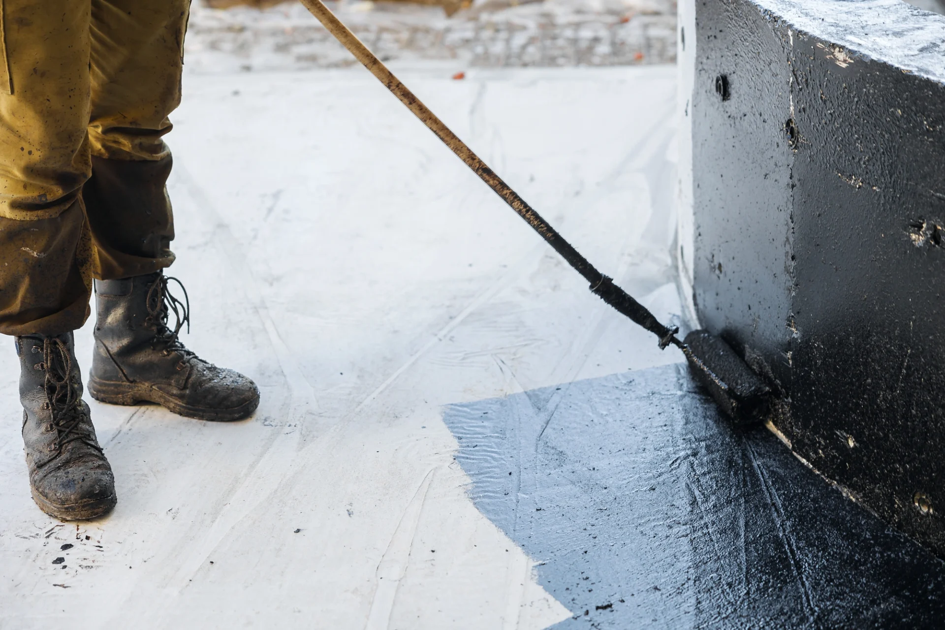 Coating Being Placed On Basement To Prevent Water Leaks