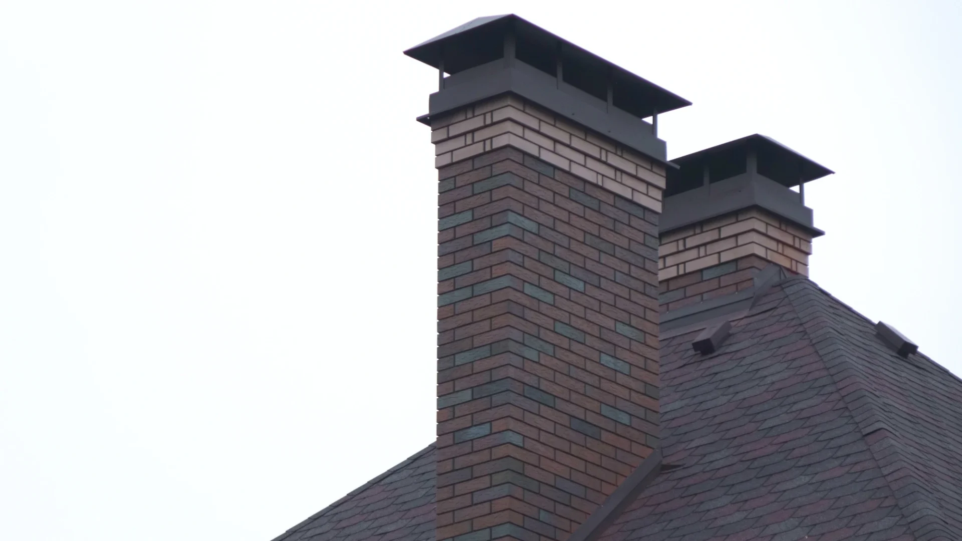 Roofing contractor fixing a chimney