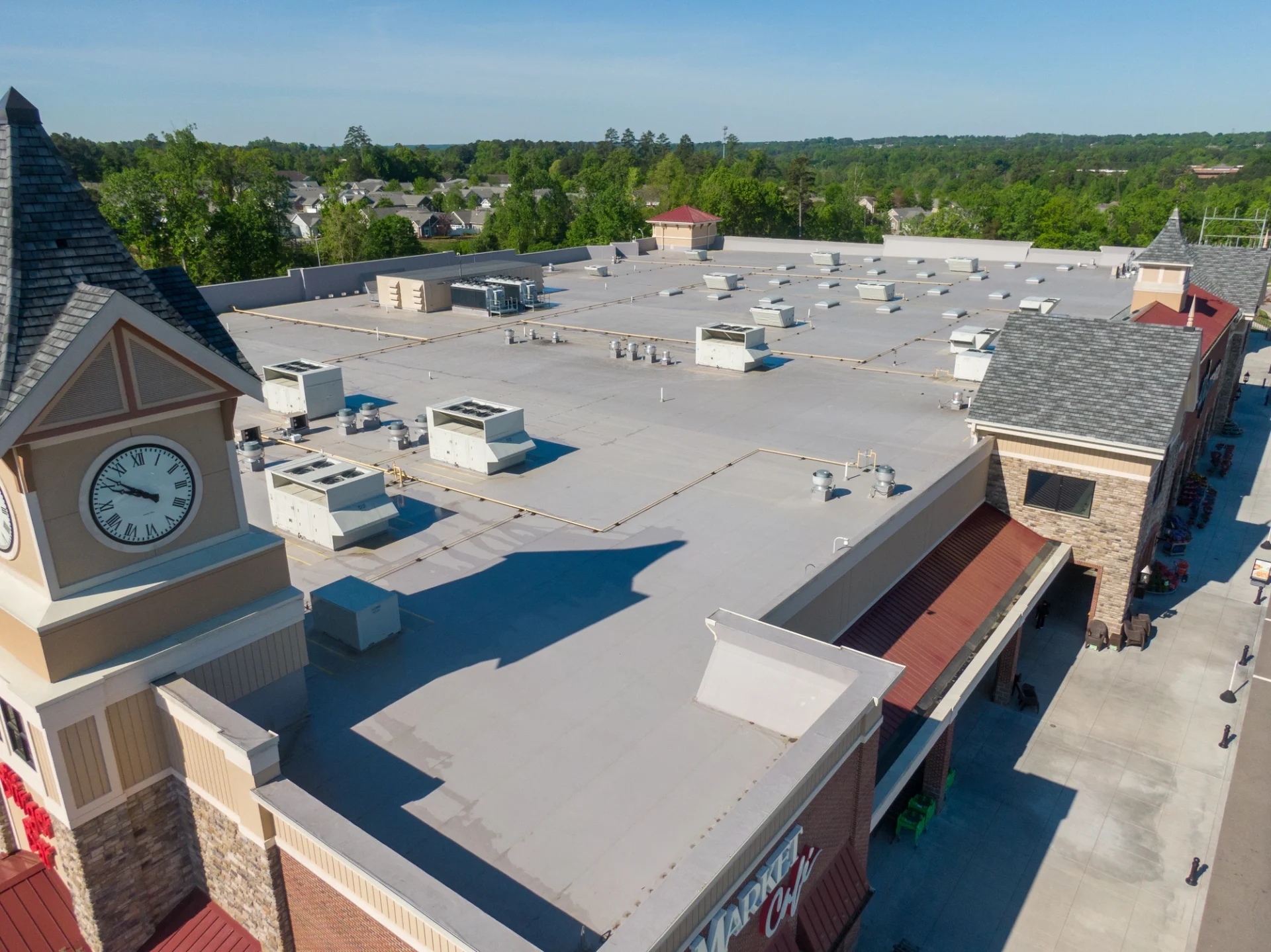 There is a view of a roof on a commercial building