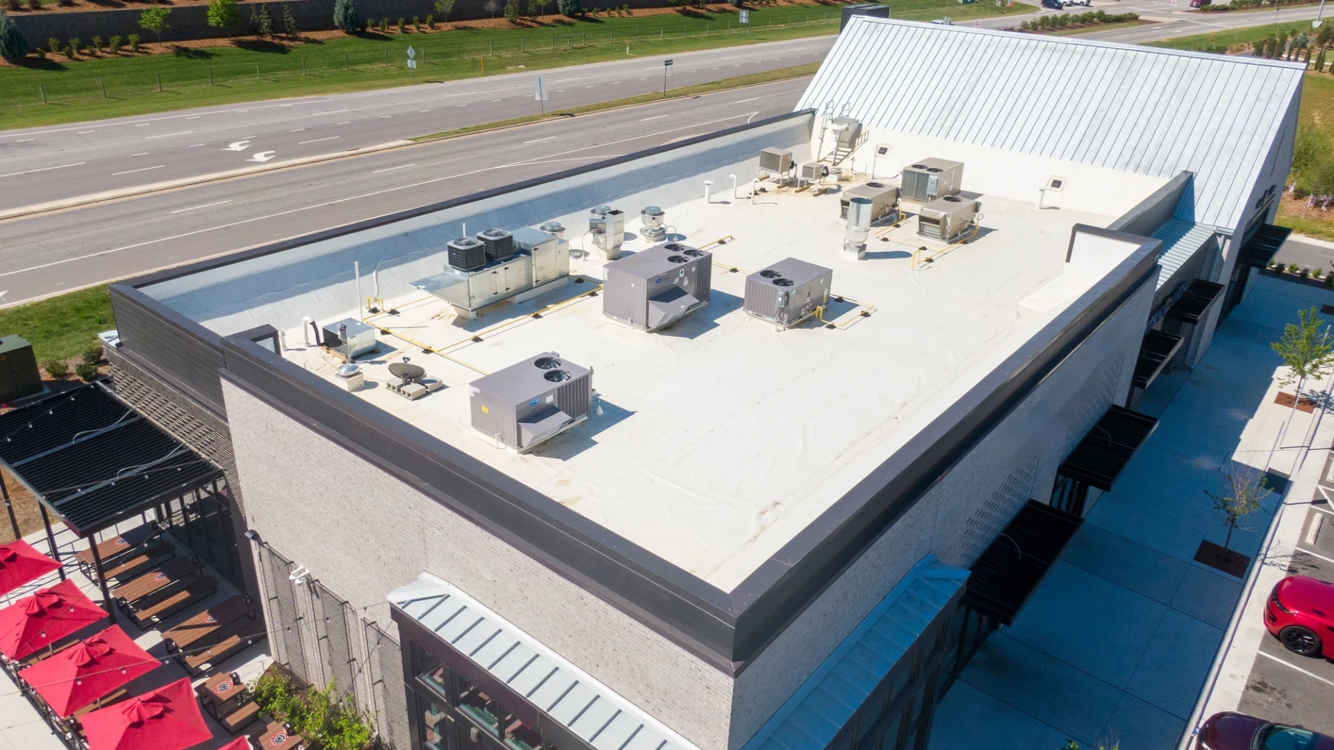 There is a white commercial roof