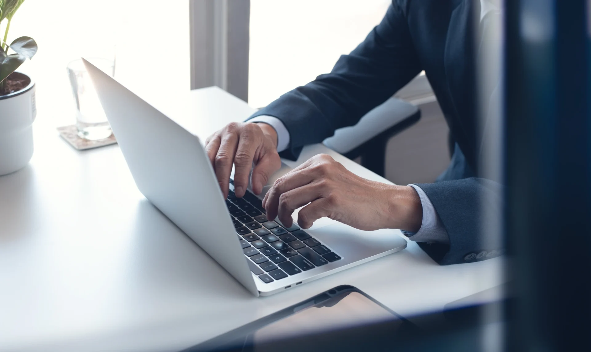 There is a black coating on a flat roof.