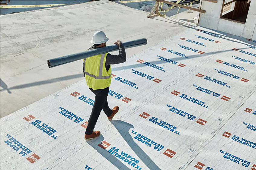 Aerial Shot Of Roofer On A Commercial Roof